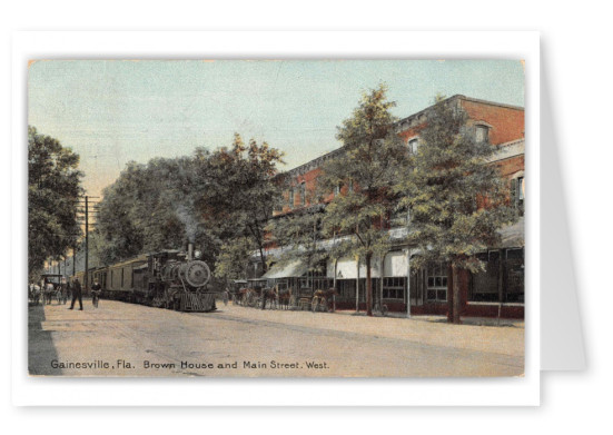 Gainesville Florida Train Passing Brown House and Main Street
