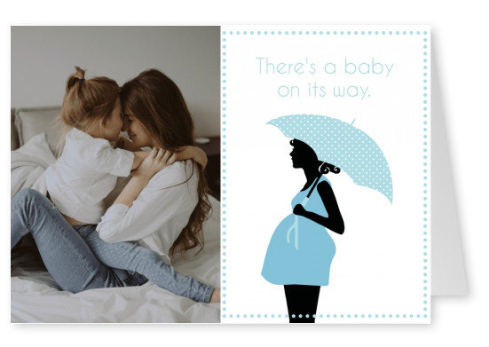 silhouette of pregnant woman with umbrella and polkadot frame