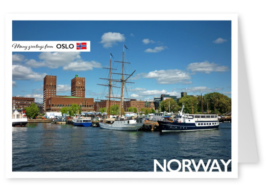 Photo of Oslo's city hall next to ships in the harbour–mypostcard