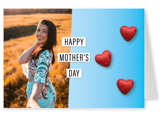 Happy Mother's Day: 3 red hearts made of cotton with polkadots on light blue background