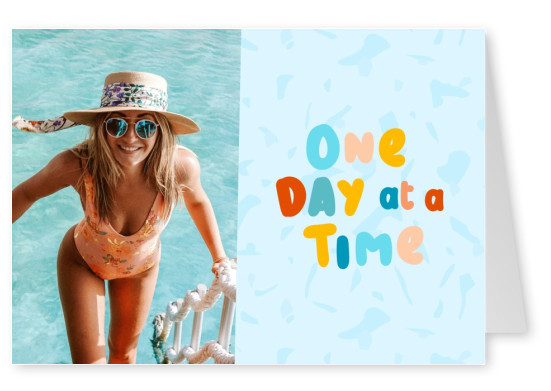 postcard saying One day at a time