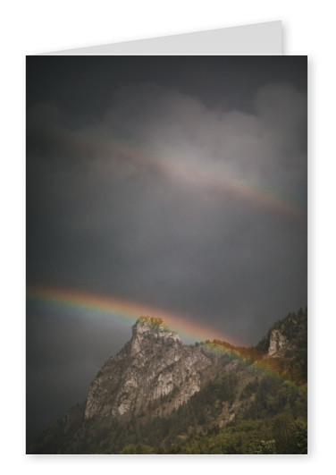 Card with mountains and rainbows
