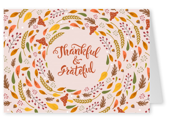Thankful & Grateful. Texte écrit à la main et de feuilles.