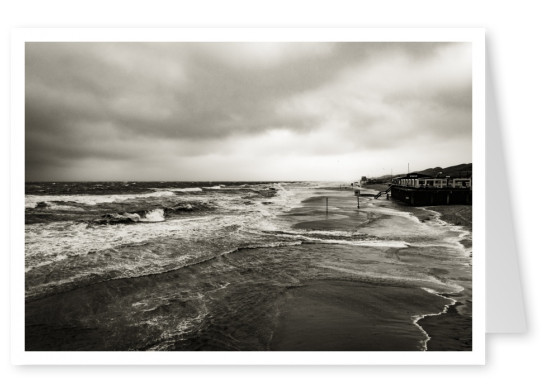 black and whote photo of a flat beach with tide