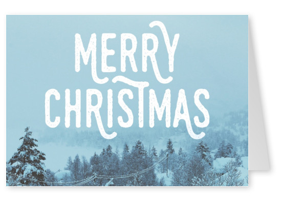 Weihnachtsgrußkarte in blautönen mit Foto einer Winterlandschaft