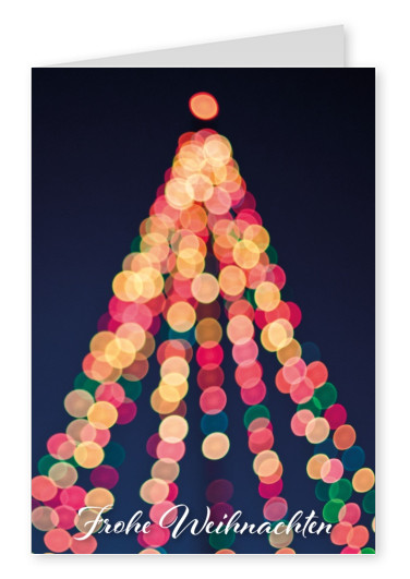 Weihnachtskarte mit Fotografie von bunt leuchtenen Weihnachtsbaum