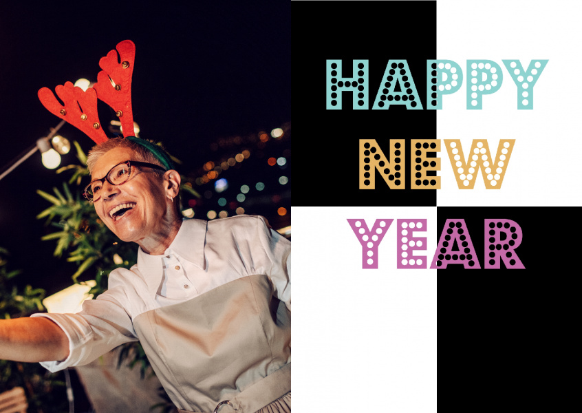 black and white happy new year card with colored lettering