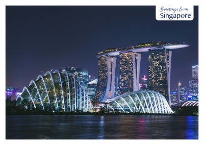 Singapore by night near the water–mypostcard