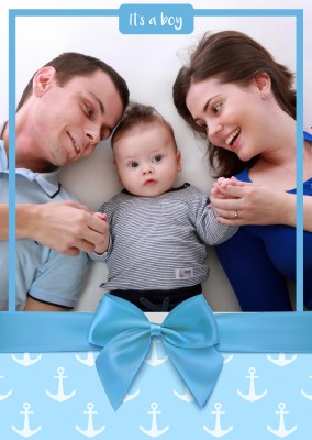 It's a boy with blue bow and anchor pattern as background