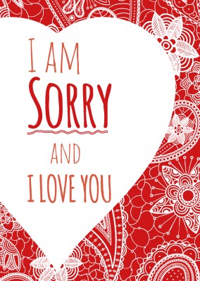WeiÃŸes herz mit dem spruch I am sorry. and i love you vor einem rot weiÃŸem Blumenmuster