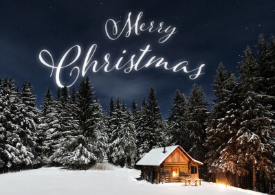 Merry Christmas-Schriftzug auf verschneiter Landschaft