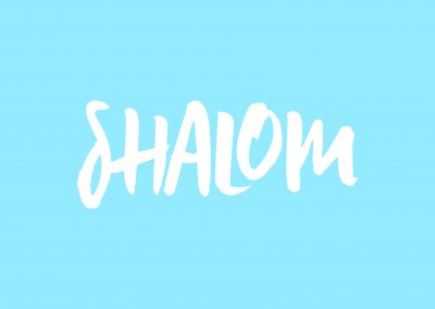 Shalom in white with blue background
