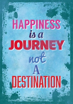 Saying happiness is a journey not a destination in different colours and fonts on a splash-patterned blue background